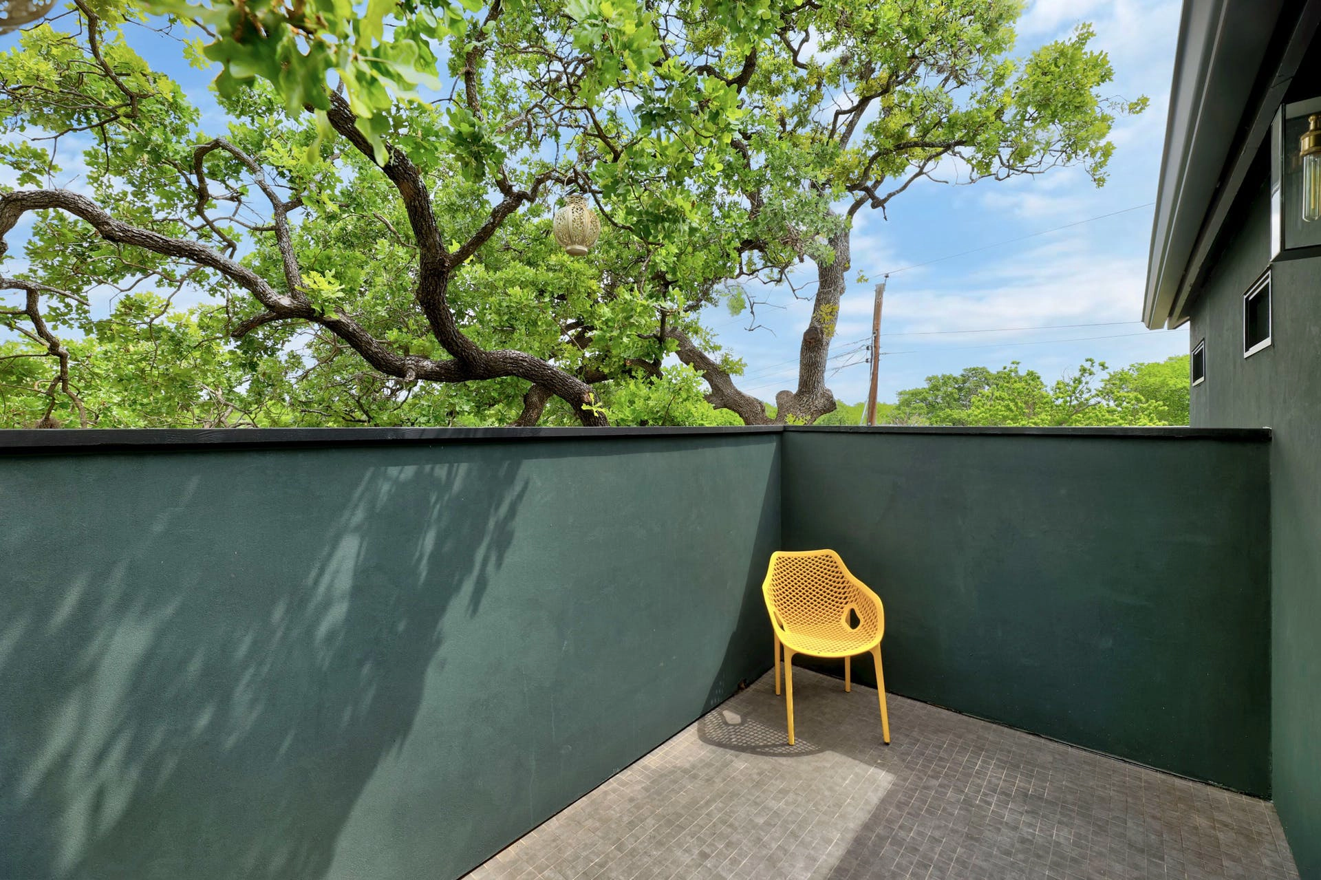 dwell_best_construction_austin_TX_home_builder_remodels_additions_residential_east_austin_home_balcony_modern