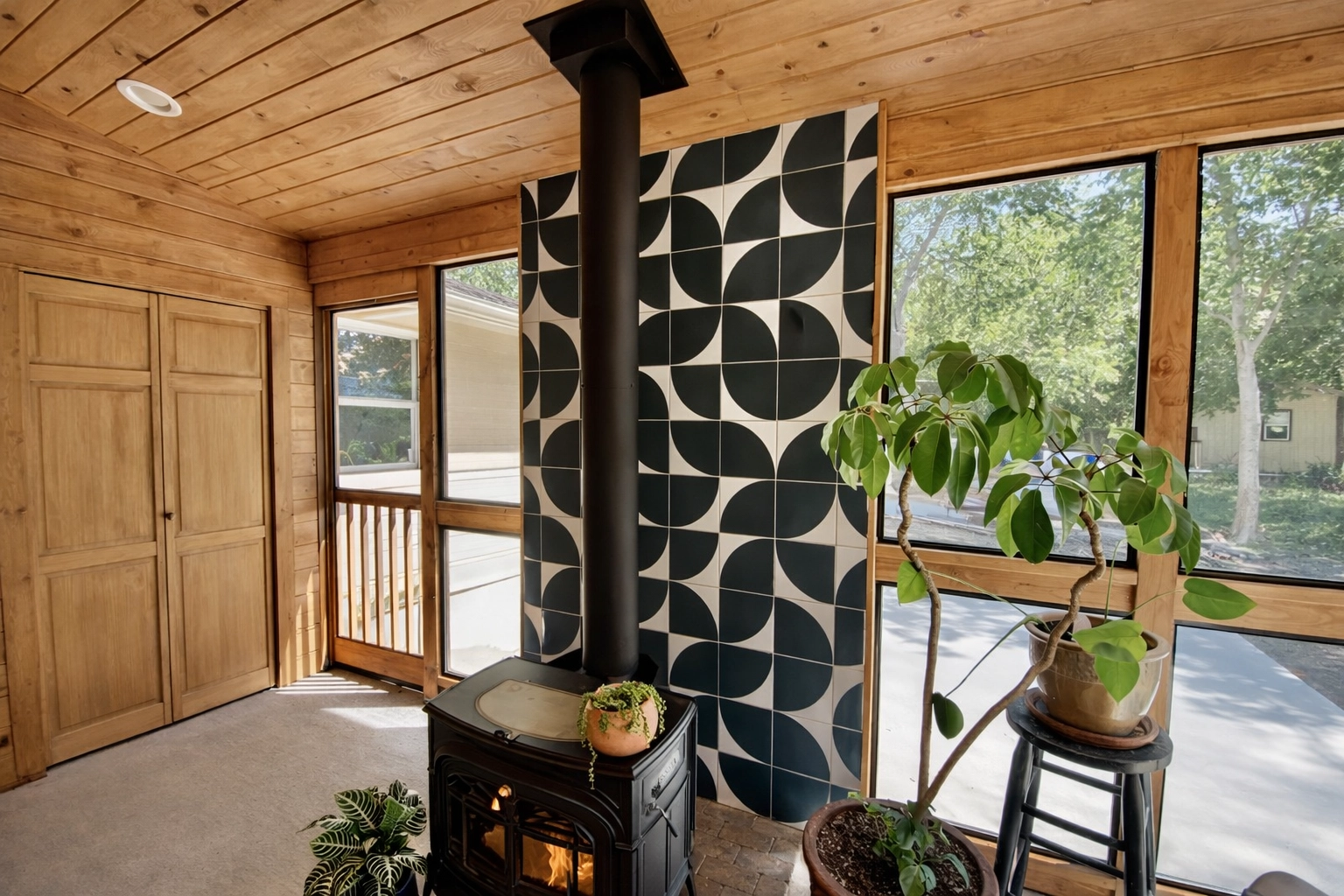 dwell_best_construction_austin_TX_home_builder_custom_new_outdoor_fireplace_custom_tile