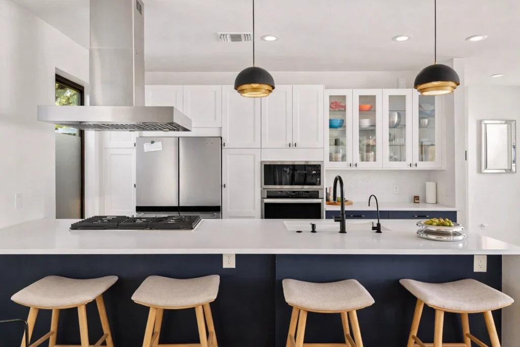 Modern kitchen renovation with quartz countertops and custom cabinetry