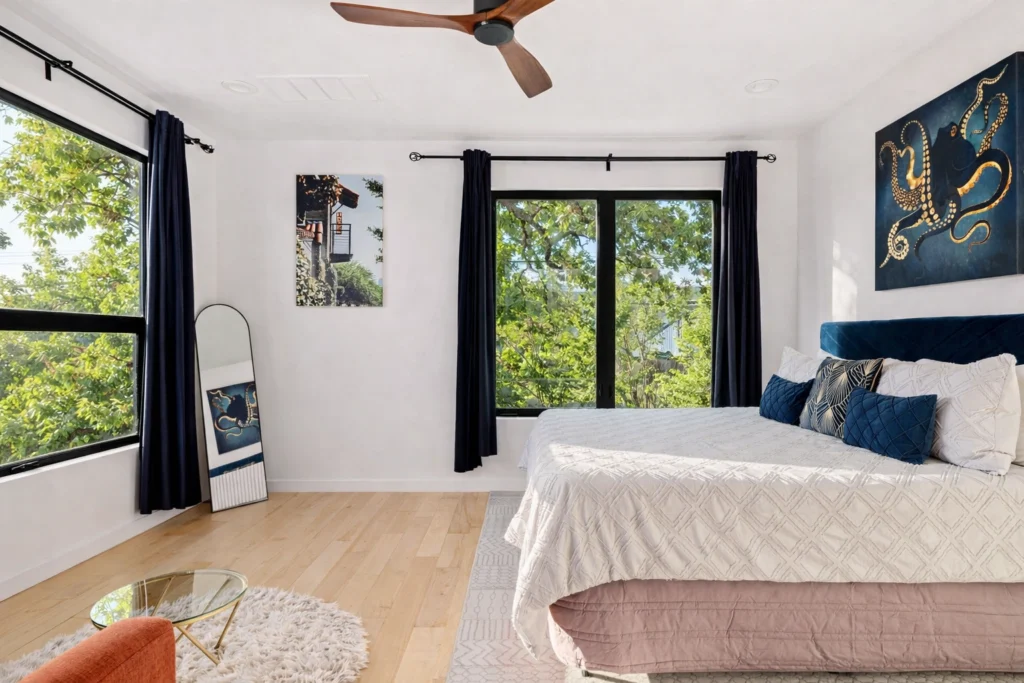 Modern bedroom remodel with large windows and minimalist interior