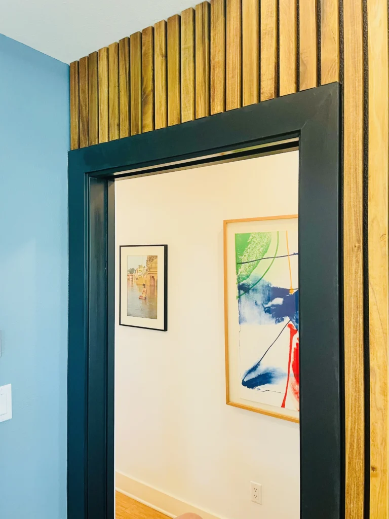 Modern interior doorway with vertical wood slat design